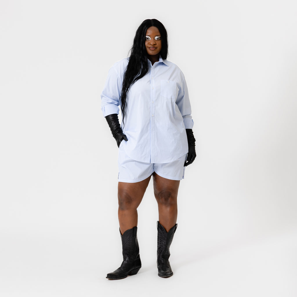 SKYLER light blue striped cotton poplin boxer shorts with elastic waistband, button fly, side pockets, and side slits by Dorilou