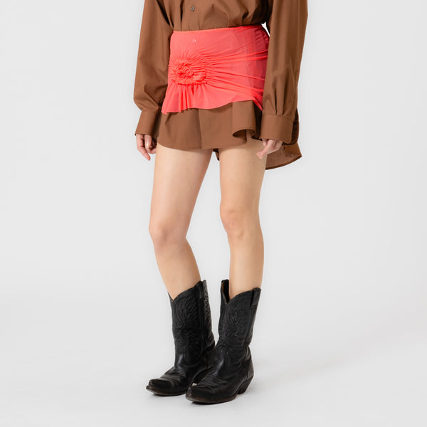 RICKI bold mini skirt with spiral ruching detail and high-waist fit in vibrant coral mesh by Dorilou